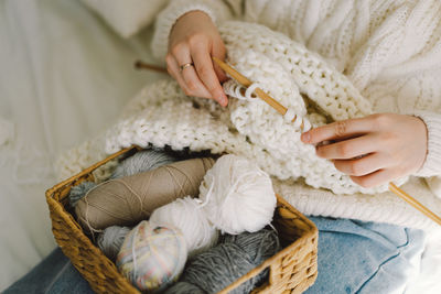 Teengirl knitting at home. handmade and hobby.