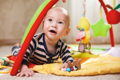 High angle view of cute girl playing with toy