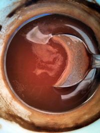 High angle view of coffee in cup on table