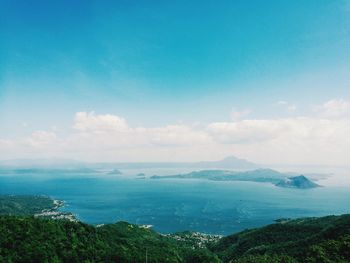 Scenic view of sea against blue sky