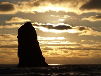 Scenic view of rock formation at sunset