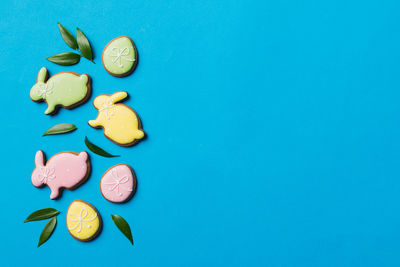 Directly above shot of pills on blue background