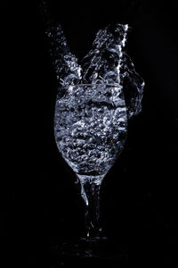 Close-up of water against black background