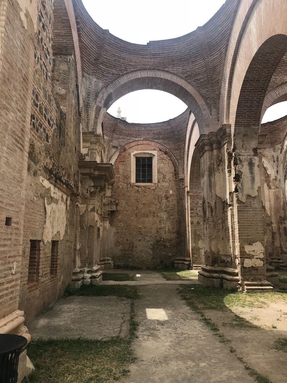 VIEW OF HISTORIC BUILDING WITH OLD RUIN