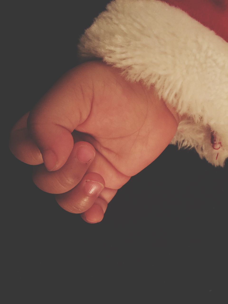 indoors, person, close-up, part of, sleeping, studio shot, high angle view, cropped, relaxation, black background, human finger, eyes closed, lifestyles, unrecognizable person, lying down, bed