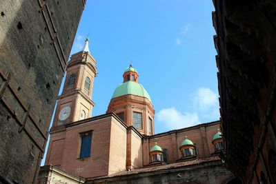 Low angle view of bell tower against sky