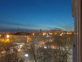 High angle view of illuminated buildings at night