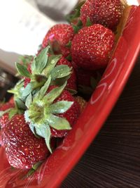 High angle view of strawberries on table