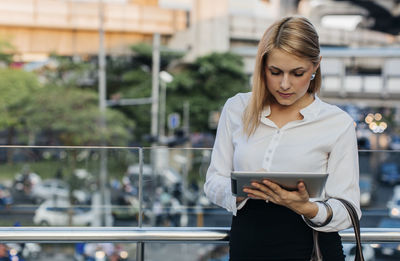 Businesswoman using tablet