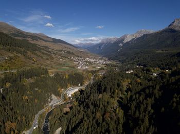 Aerial view of valley and mountains against sky