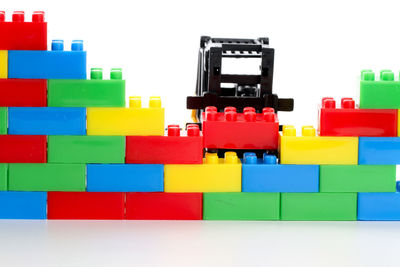Close-up of toys against colored background