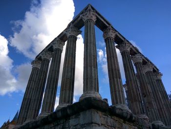 Low angle view of old temple against sky