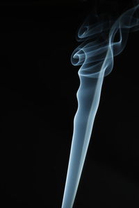 Close-up of smoke against black background