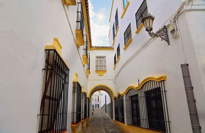 Low angle view of yellow buildings against sky