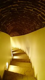 Low angle view of staircase in illuminated building