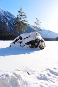 Scenic view of snow covered mountain against sky