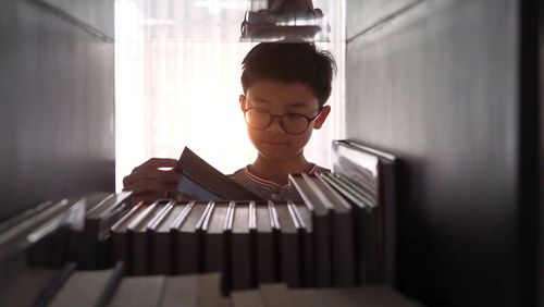 Portrait of boy playing piano