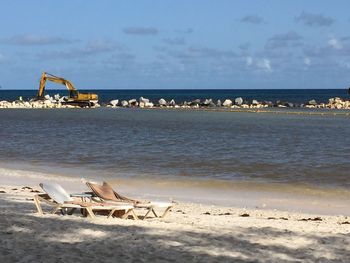 Scenic view of beach against sky