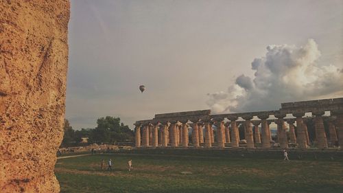 View of historical building against cloudy sky