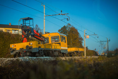 Train on railroad track against sky