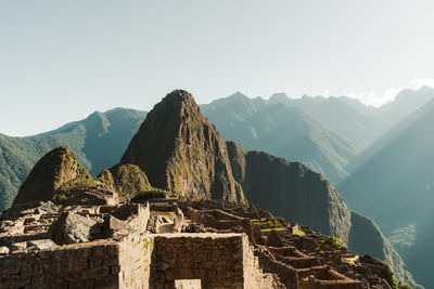 Machu picchu old inca ruins at sunrise in peru