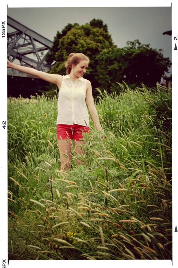 transfer print, grass, lifestyles, leisure activity, full length, casual clothing, auto post production filter, person, field, standing, grassy, childhood, plant, young adult, elementary age, growth, day, front view