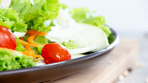 Close-up of salad in bowl on table