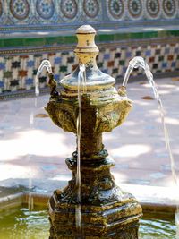 Close-up of water flowing from faucet