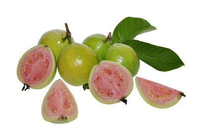 Close-up of fruits against white background