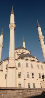 Low angle view of building against blue sky