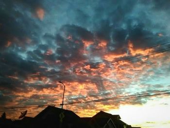 Scenic view of dramatic sky during sunset