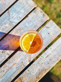 High angle view of oranges on wooden table