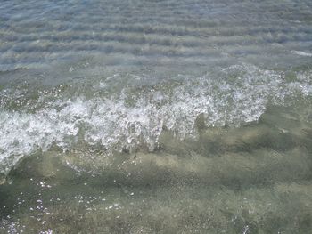 High angle view of water splashing in sea