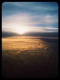 Sun shining through clouds