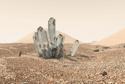 Panoramic view of desert against clear sky