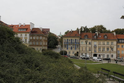 Buildings in city against sky