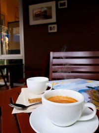 Coffee cup on table