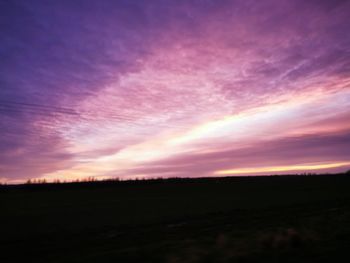 Scenic view of silhouette landscape against sky during sunset