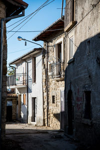 Alley amidst buildings in town