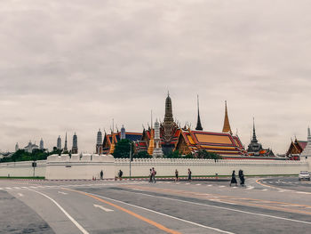 View of city against cloudy sky