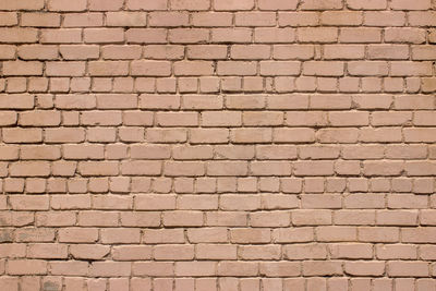 Background of old vintage brick wall texture