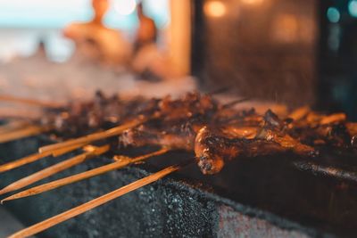 Close-up of crab on barbecue grill