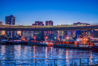 Illuminated buildings in city at night