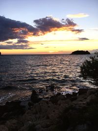 Scenic view of sea against sky during sunset