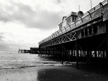 Pier over sea against sky