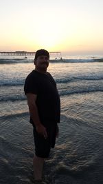 Scenic view of sea at sunset