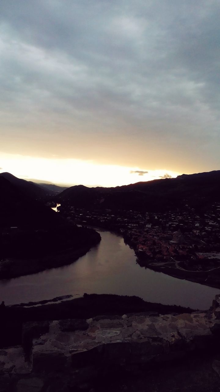 water, sky, sunset, tranquil scene, scenics, cloud - sky, tranquility, beauty in nature, nature, lake, cloudy, mountain, idyllic, cloud, reflection, sea, rock - object, dusk, river, shore