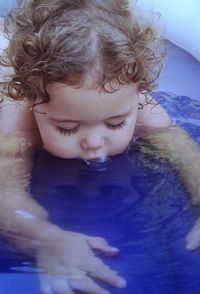 Close-up of cute baby in water