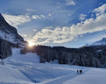 Scenic view of snowcapped mountains against sky