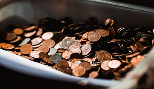 High angle view of coins on table